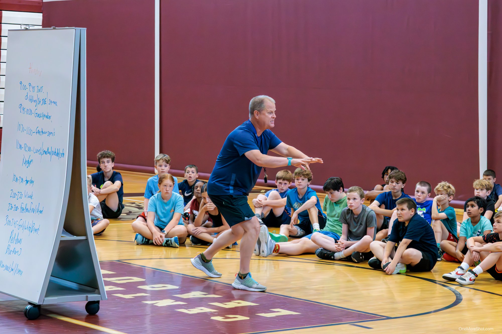 Coach Downer teaching at DBA camp
